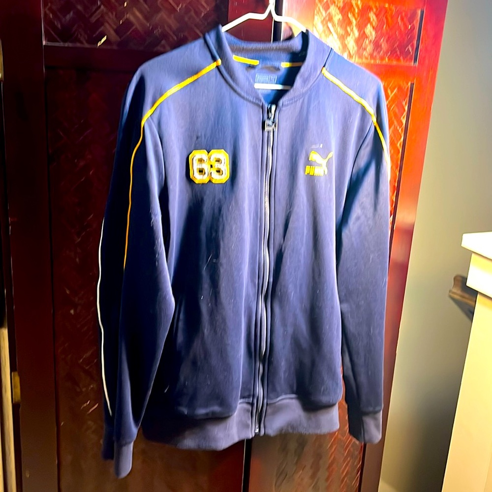 Men’s medium warm-up jacket from PUMA in fair condition